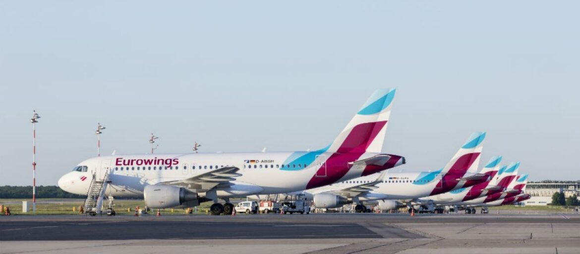 Eurowings fleet a group of airplanes on a runway