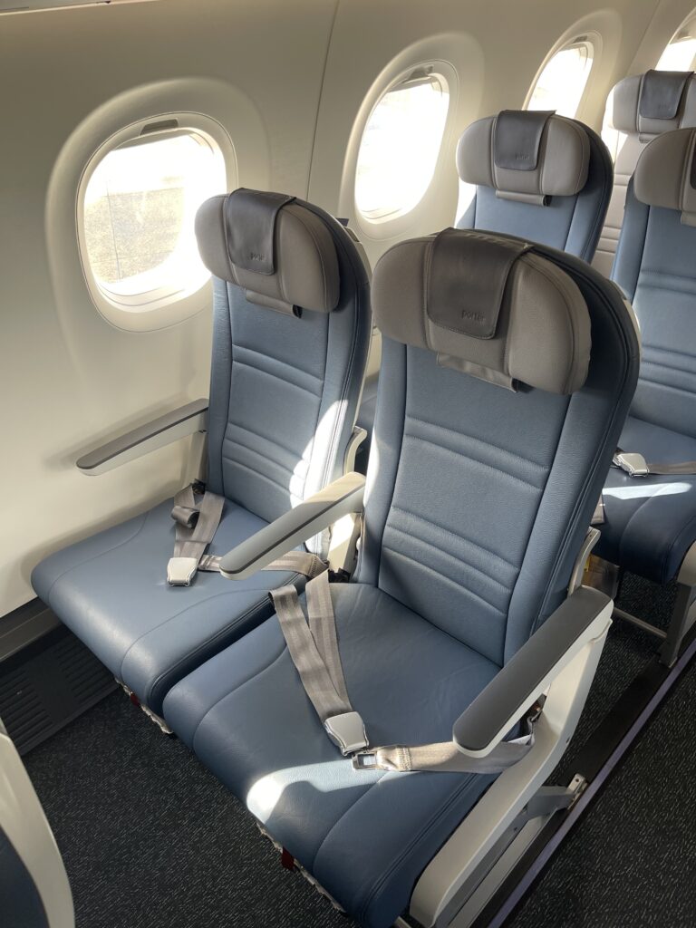 seats in a plane with windows