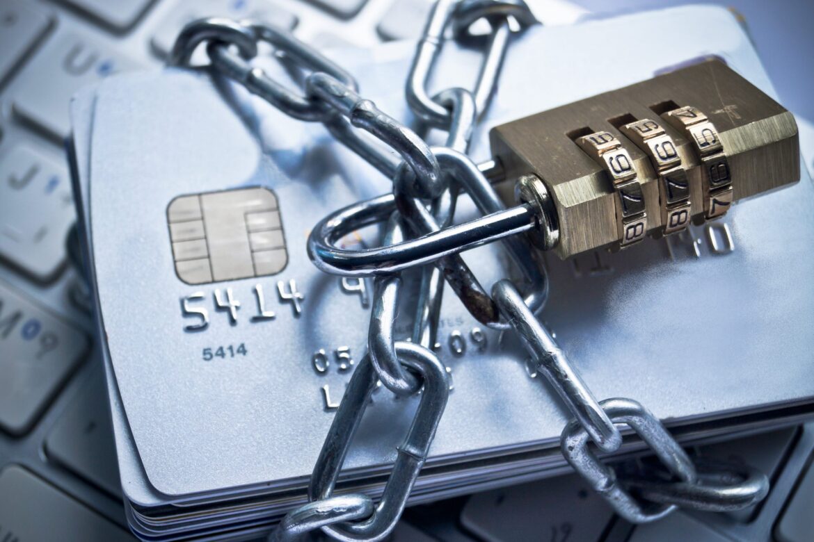 a credit card with a padlock and chain