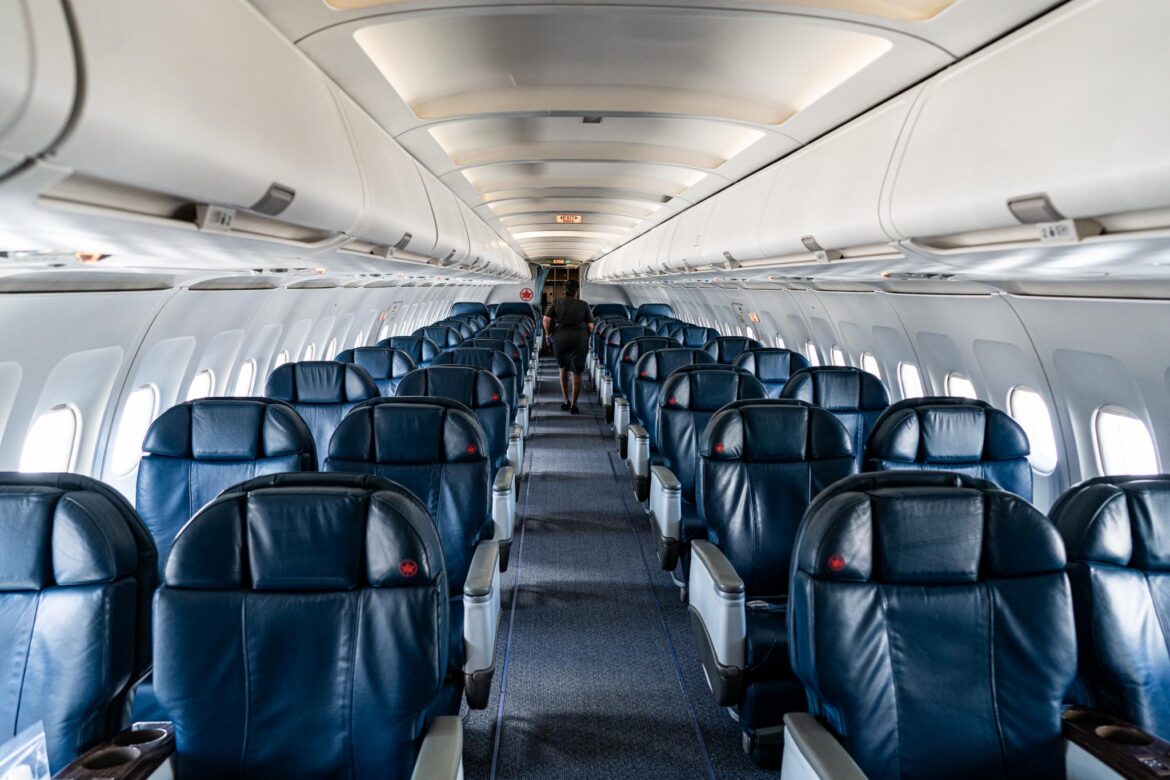 DSC03767-1-2048×1366 a person walking in an airplane