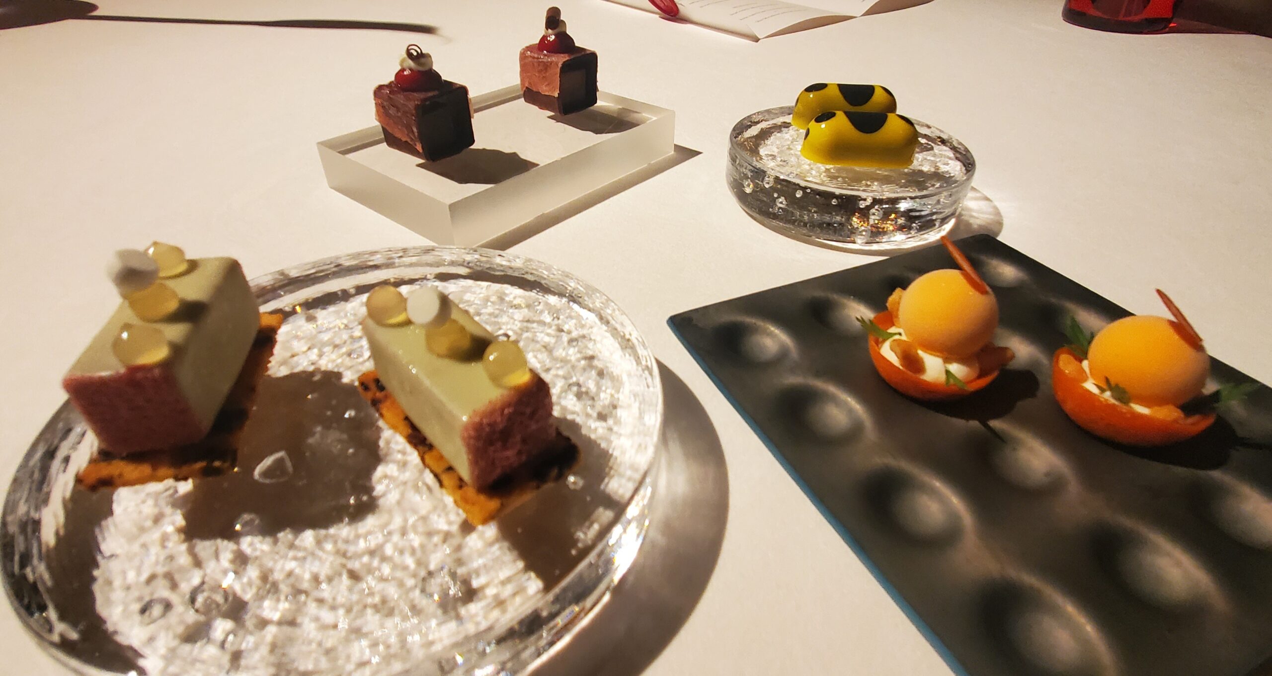 a group of small desserts on a table