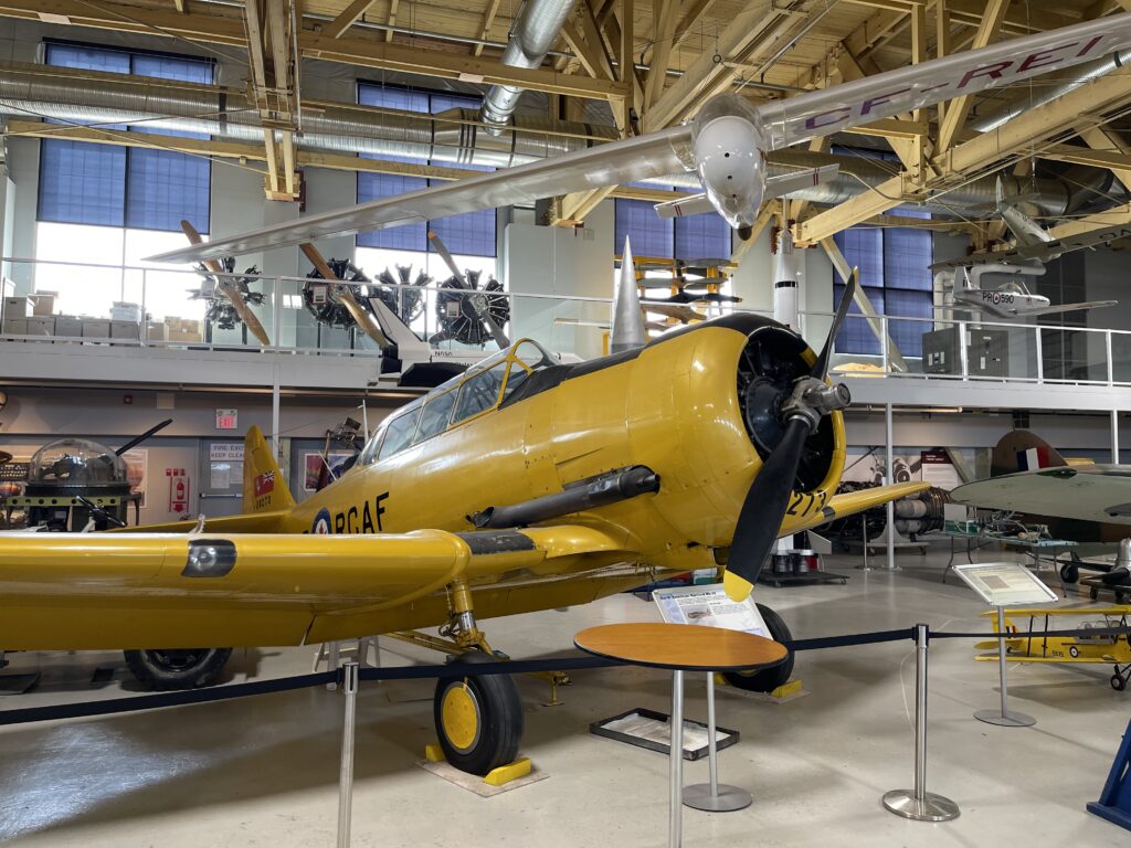a yellow airplane in a building