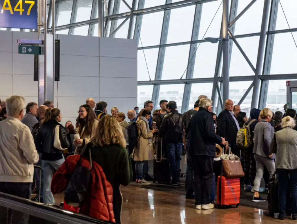 Airport Behaviour Unwritten Rules a group of people in a terminal