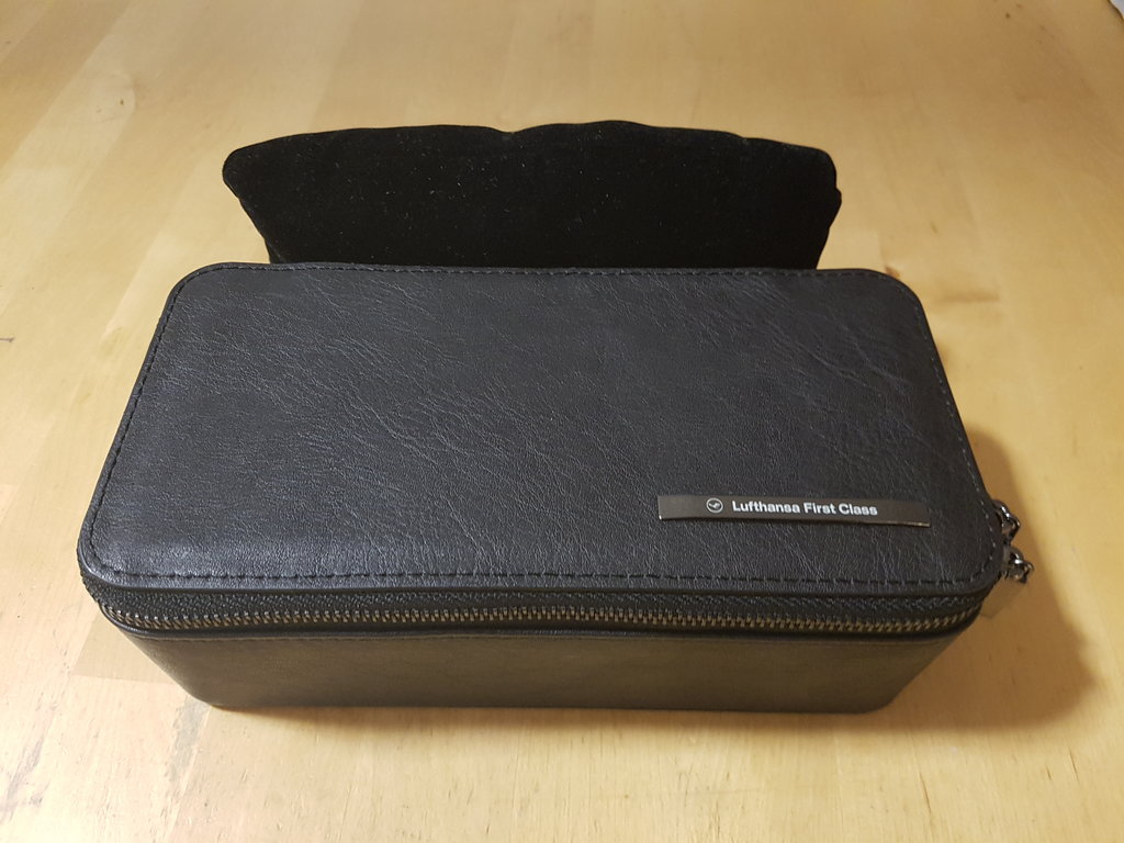 a black leather case with a zipper on it