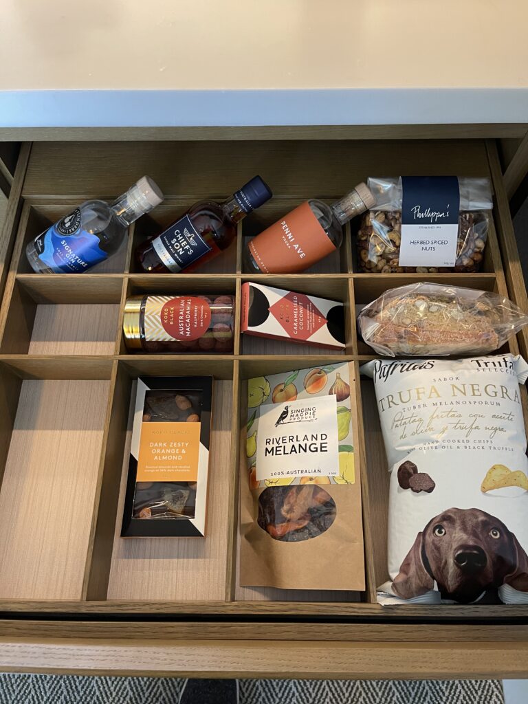 a drawer with food items and drinks