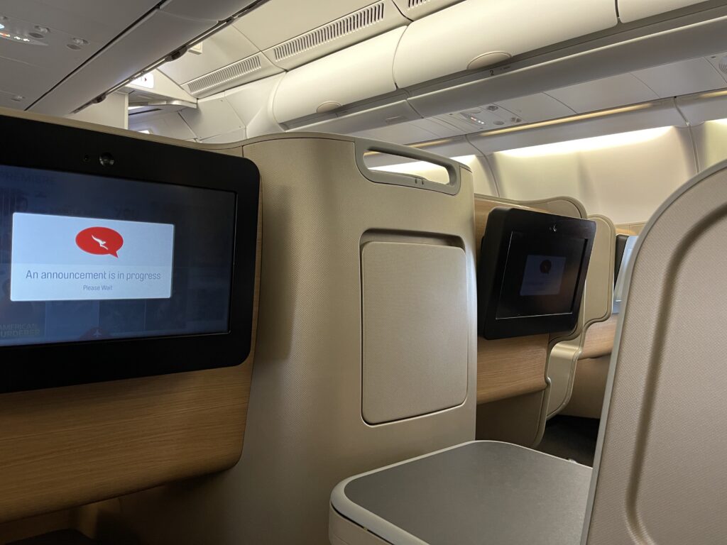a screen on the back of a plane