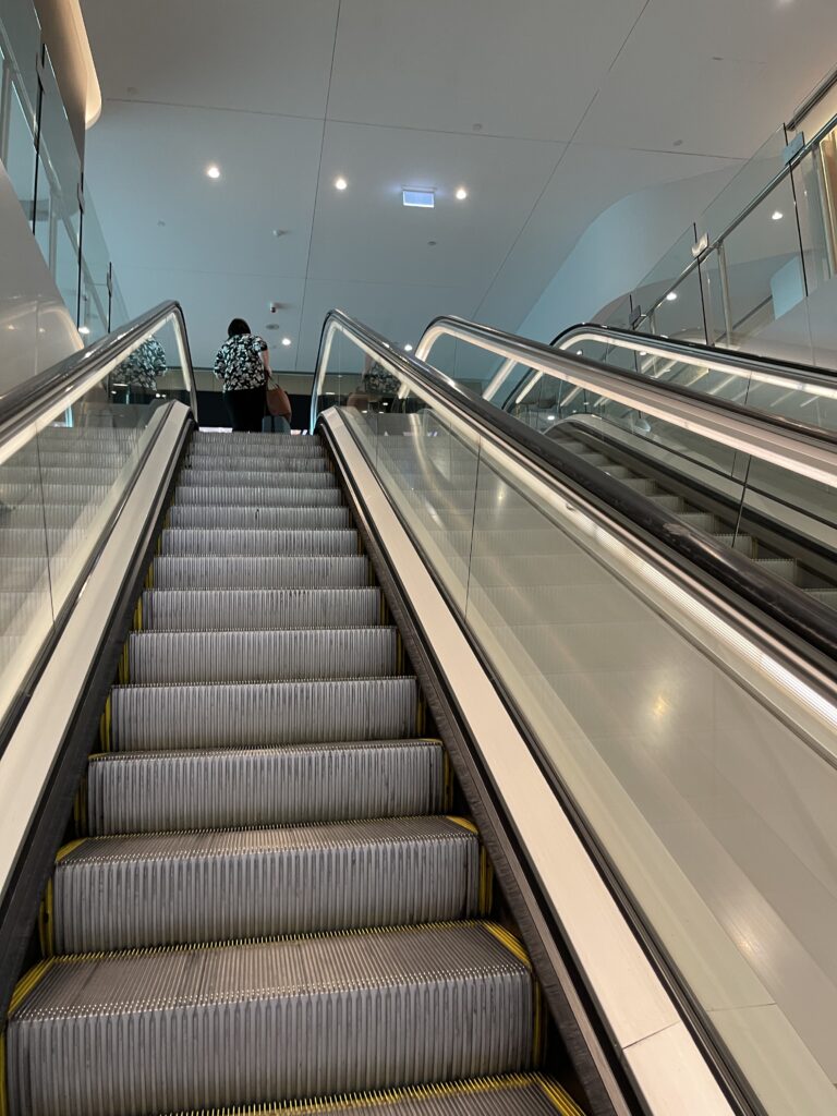 a person on an escalator