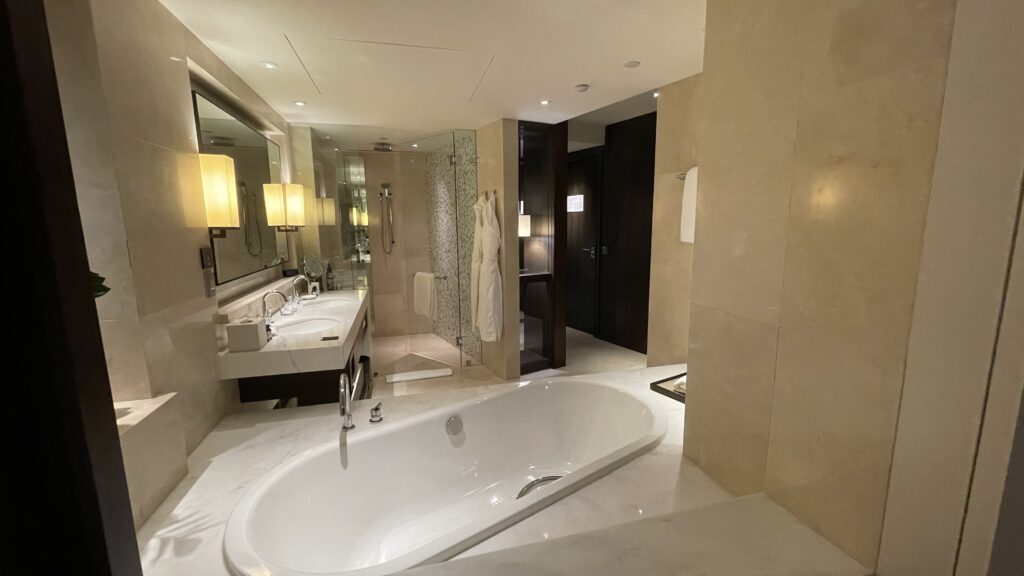 a bathroom with a tub and sink