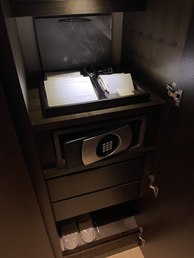 a safe with papers and a keypad