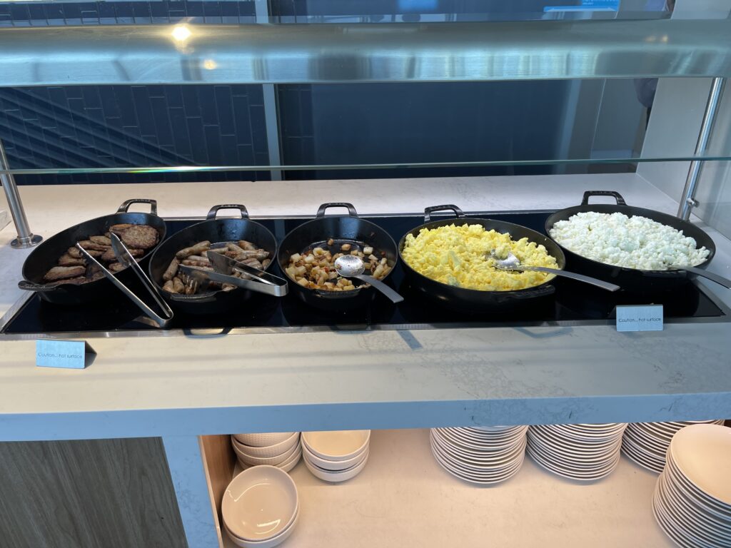 a row of pans of food