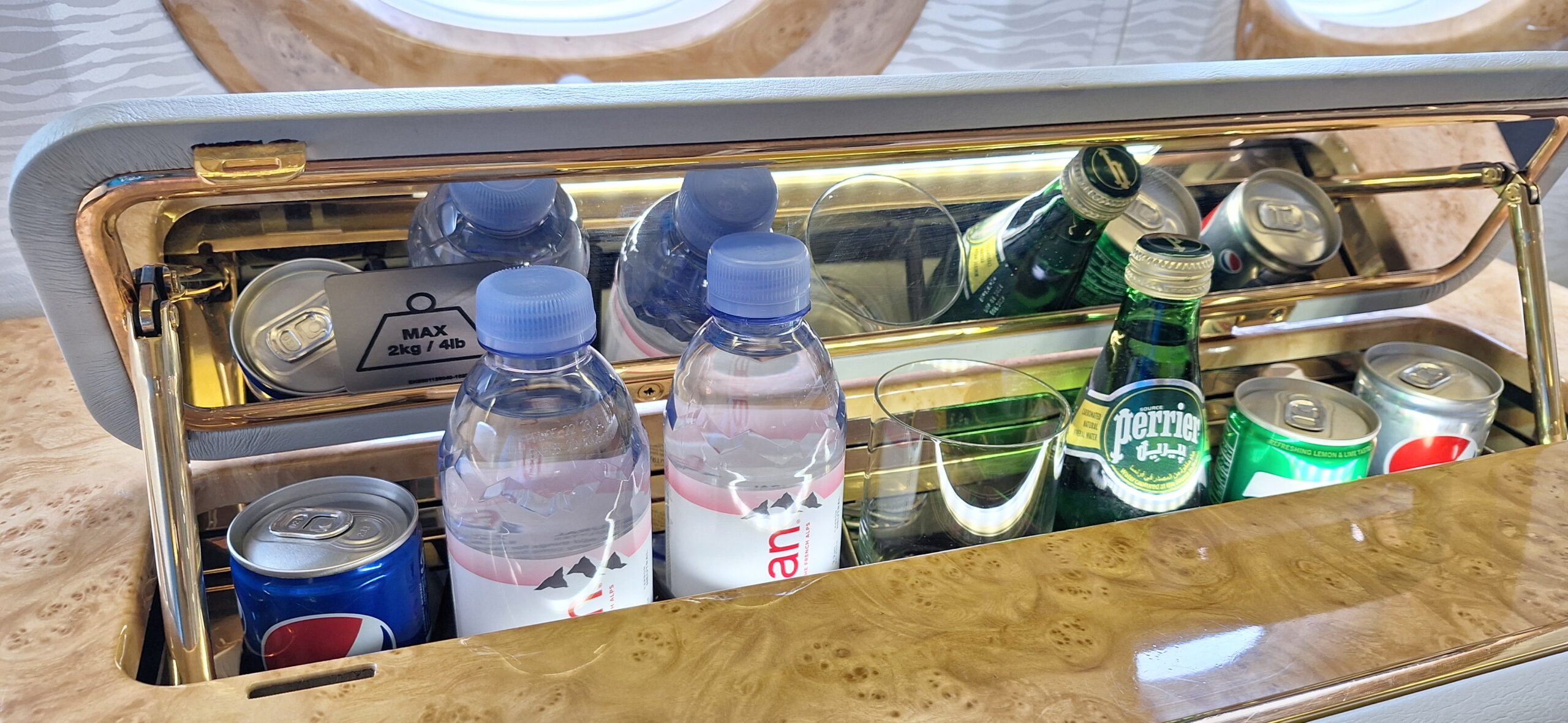 bottles of soda and other beverages in a cooler