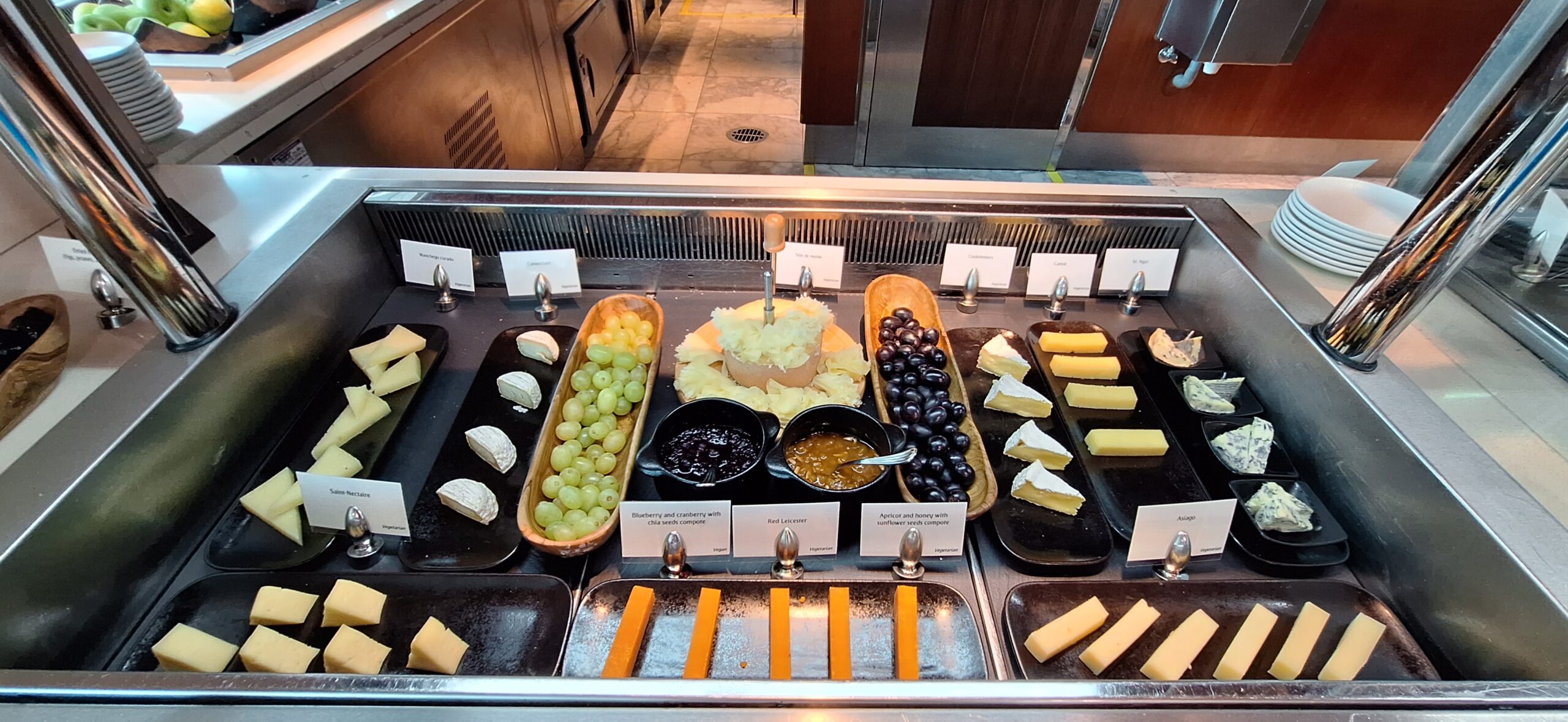 a buffet with different types of cheeses