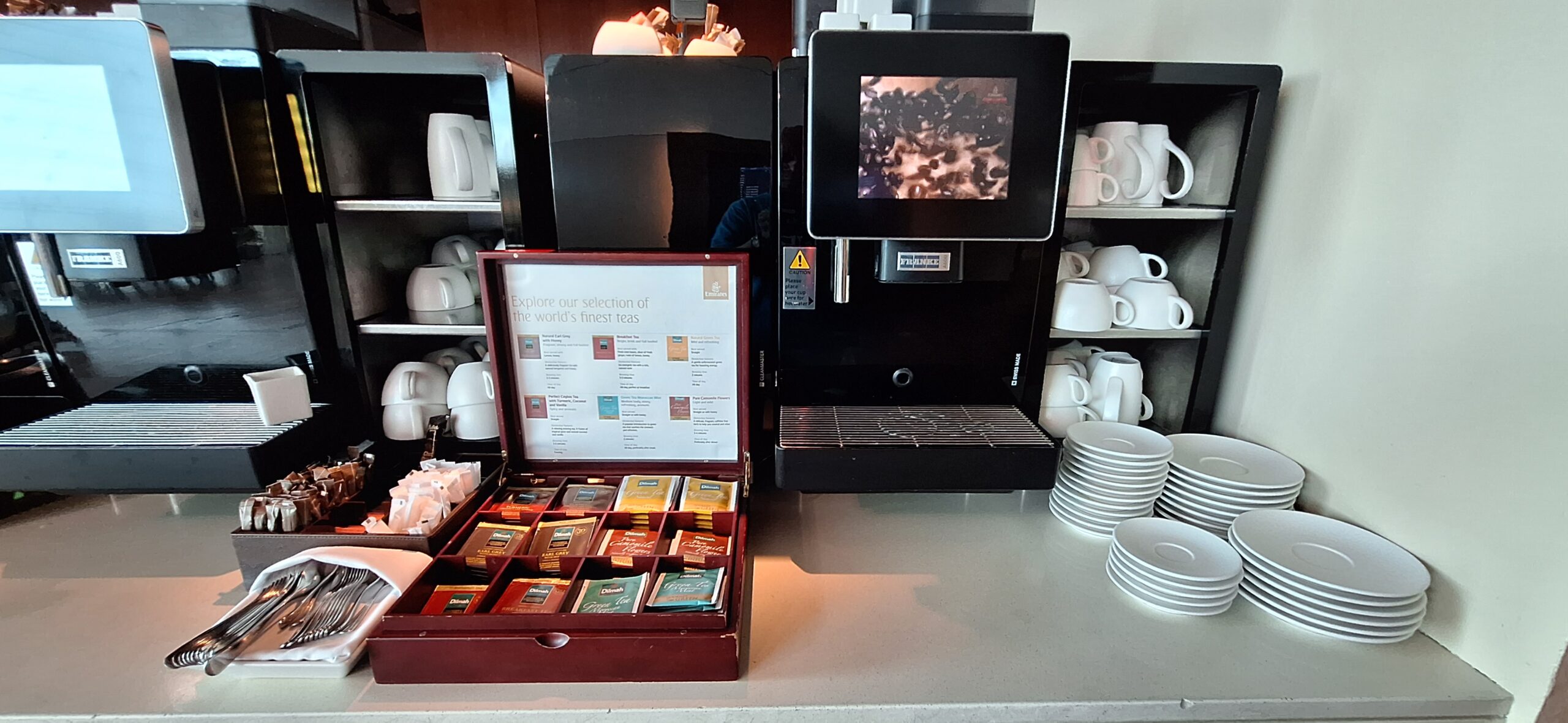 a coffee machine with a box of tea in it