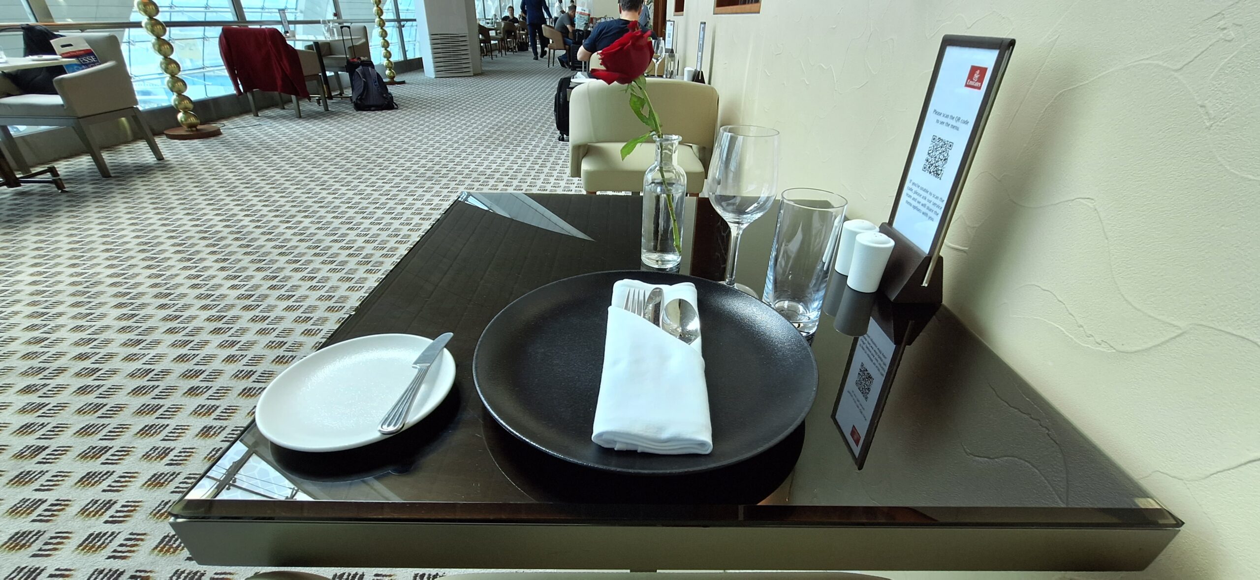 a table with a plate and silverware