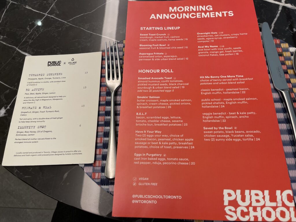 a menu and fork on a table