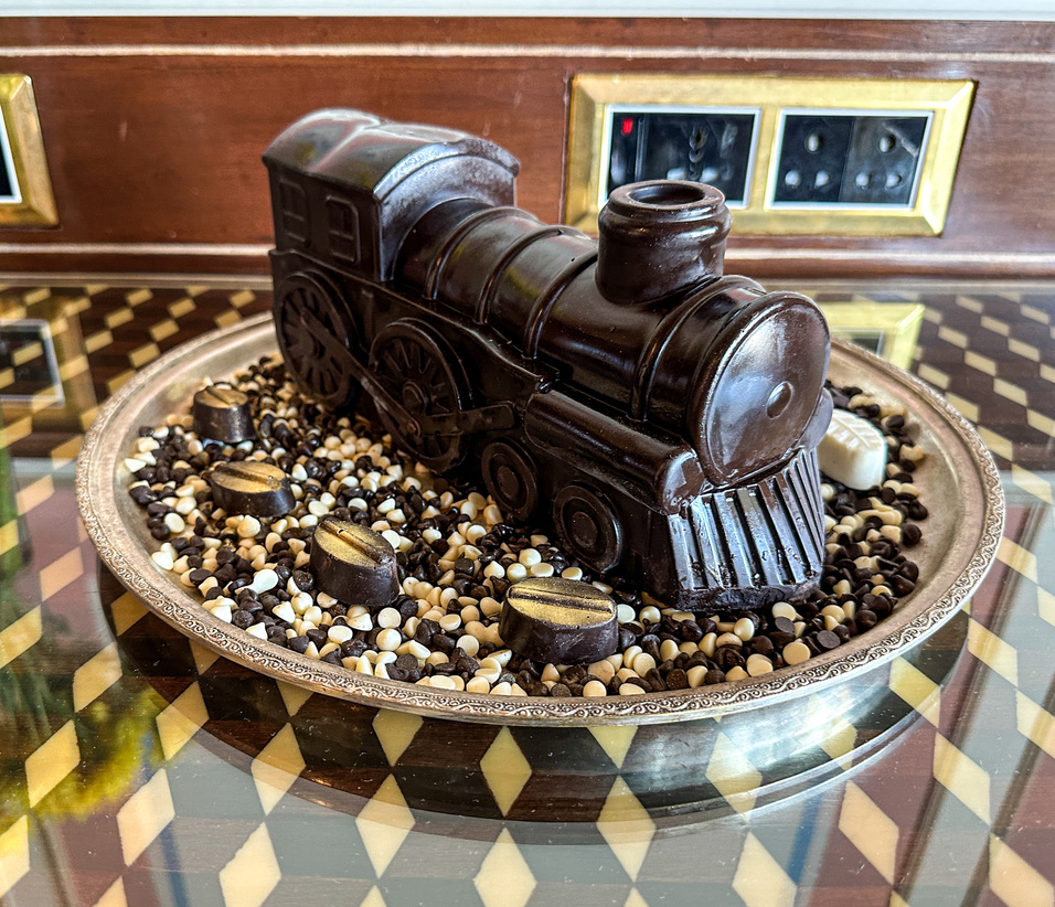 a chocolate train on a plate