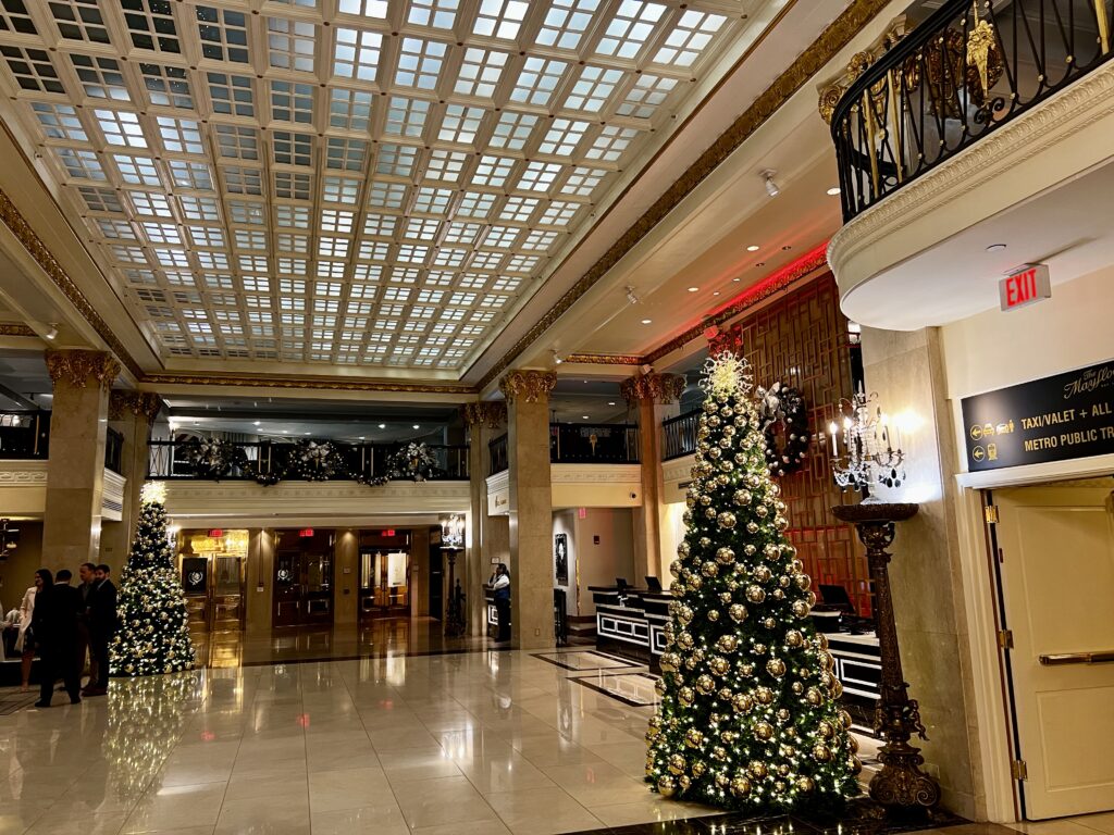 a large decorated building with a christmas tree