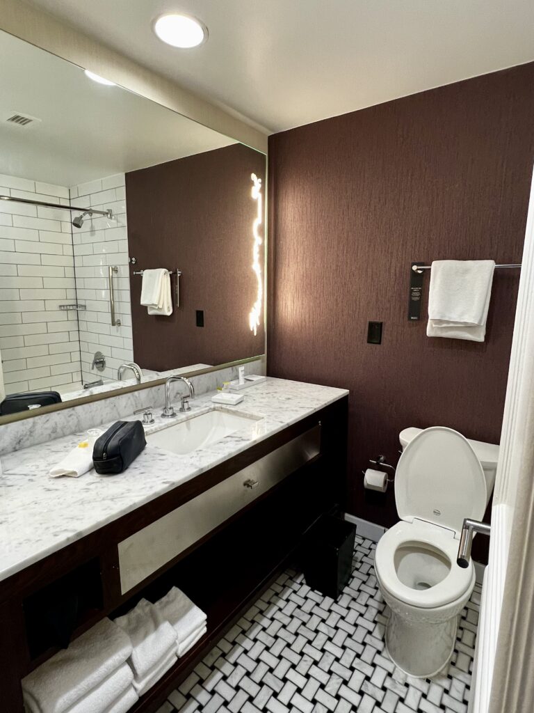 a bathroom with a sink and mirror