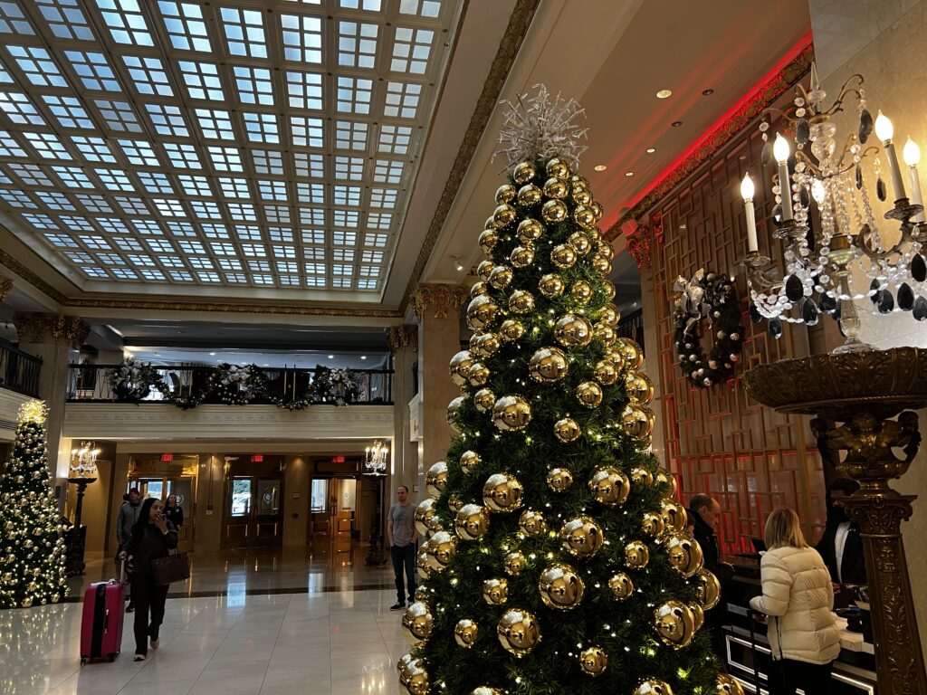 a large decorated tree in a lobby