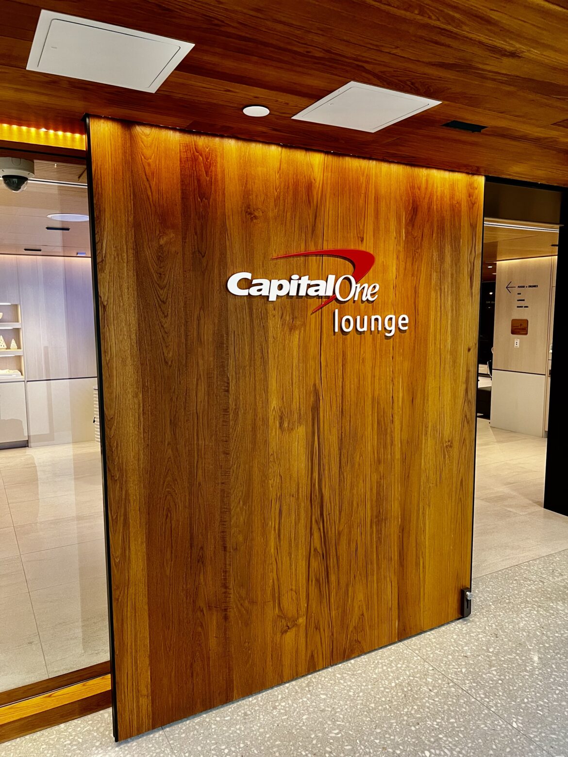 a wooden door with a logo on it