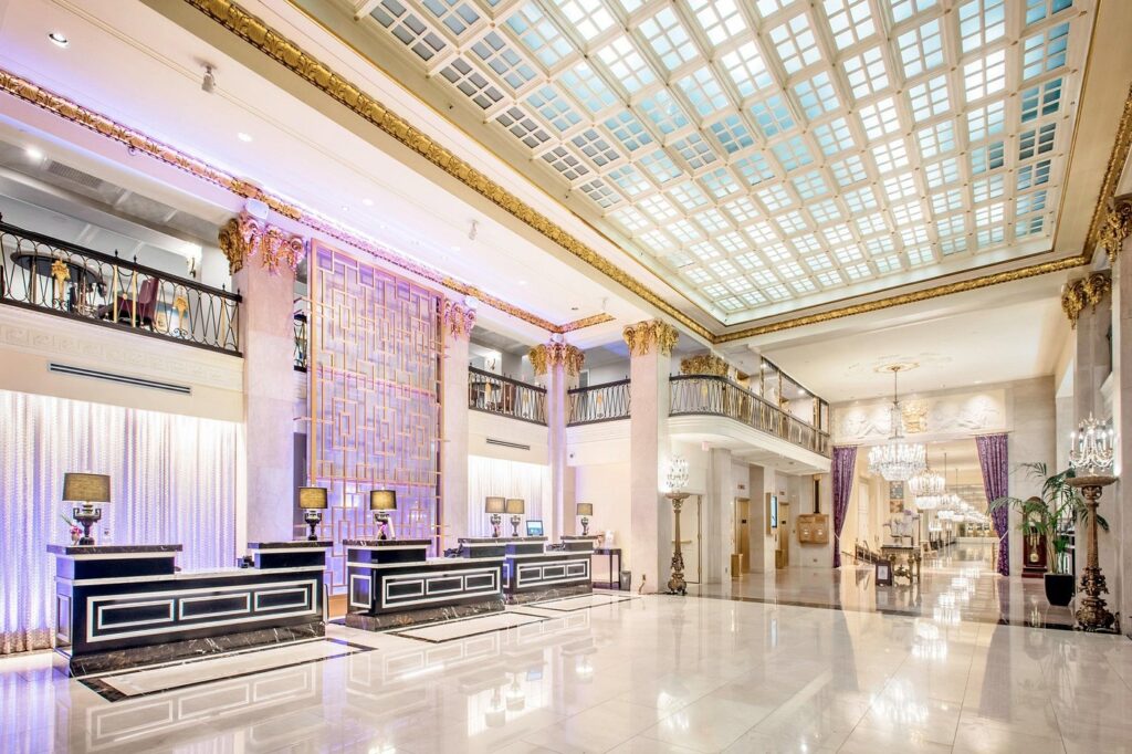 a large hall with a large ceiling and a large chandelier