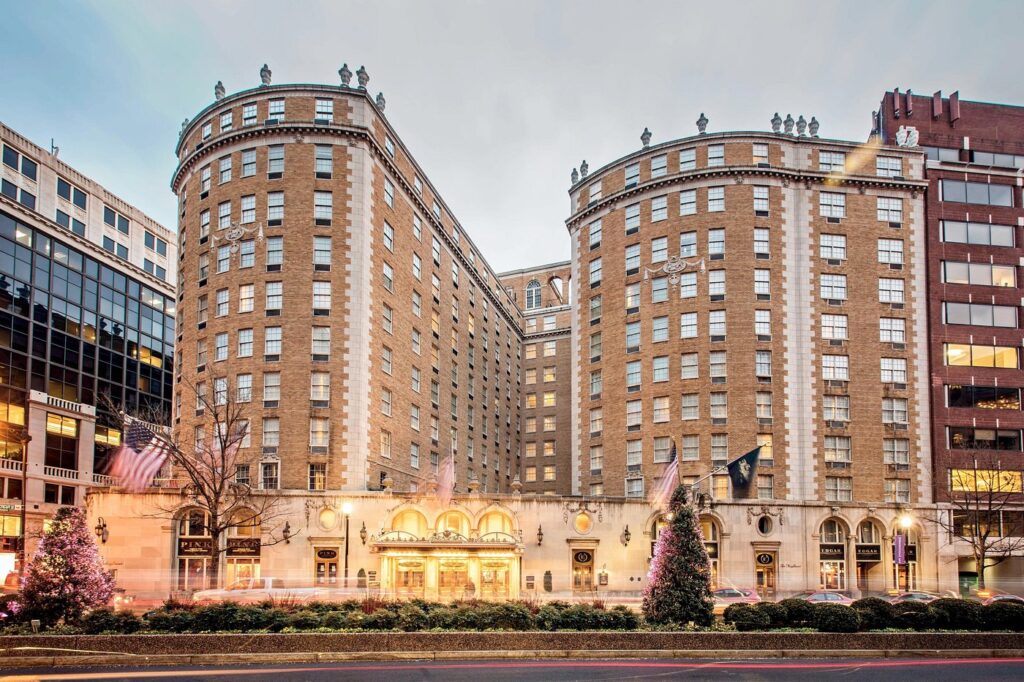 a large building with a christmas tree