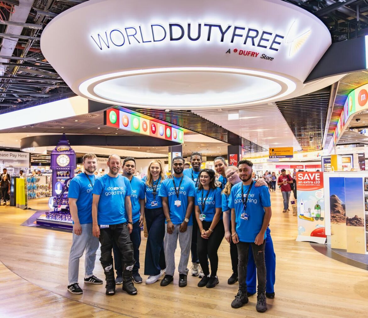 a group of people in blue shirts