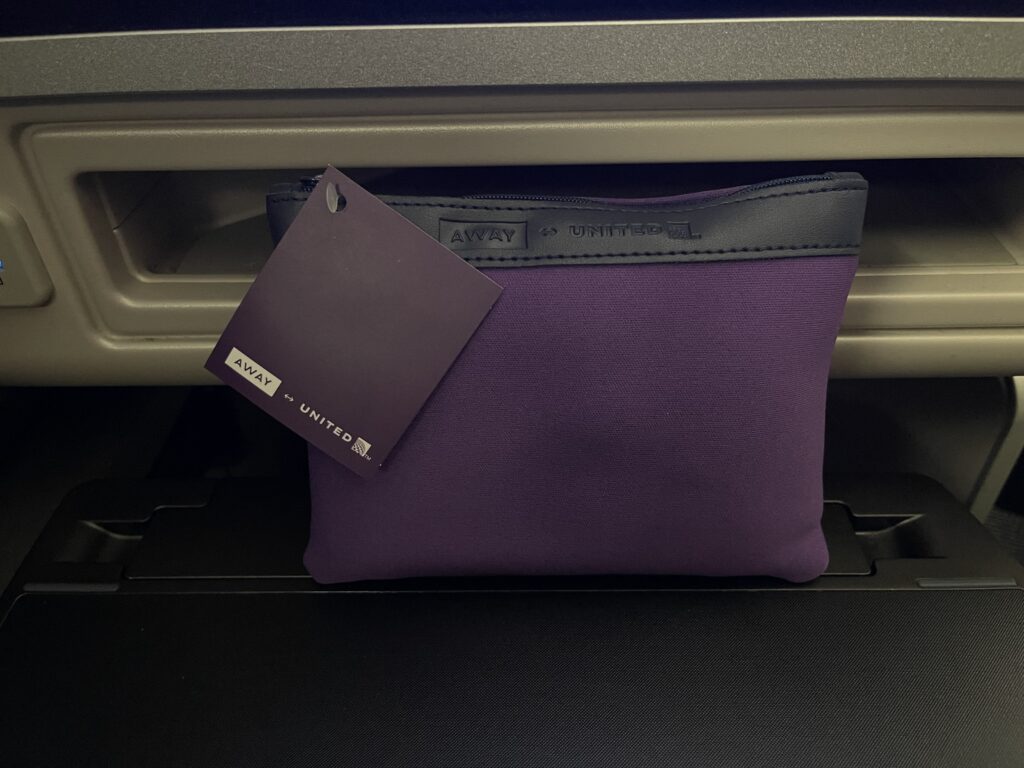 a purple bag with a tag on it