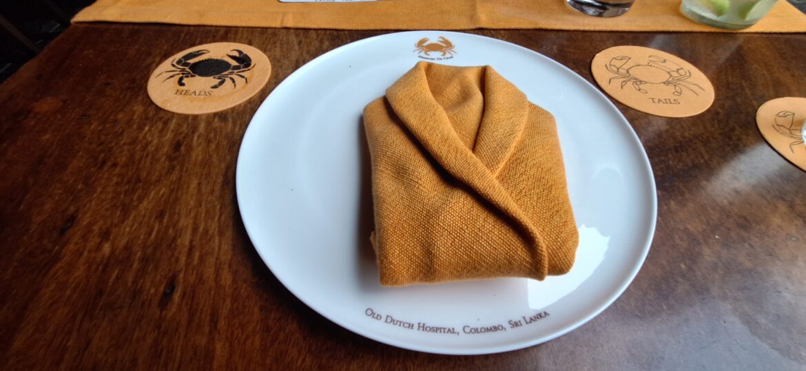 a plate with a folded napkin on it