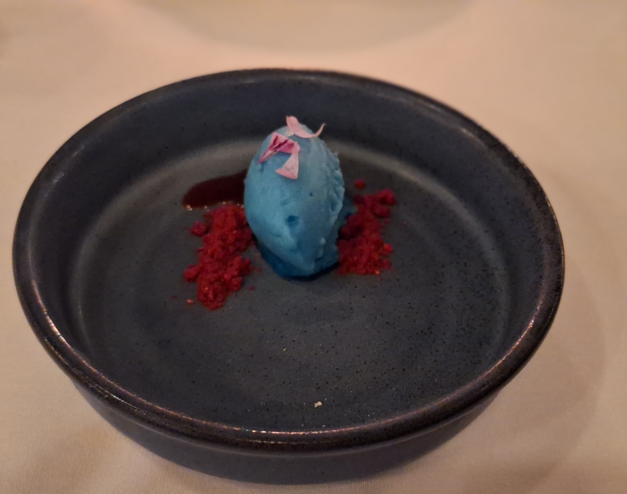 a blue ice cream in a bowl