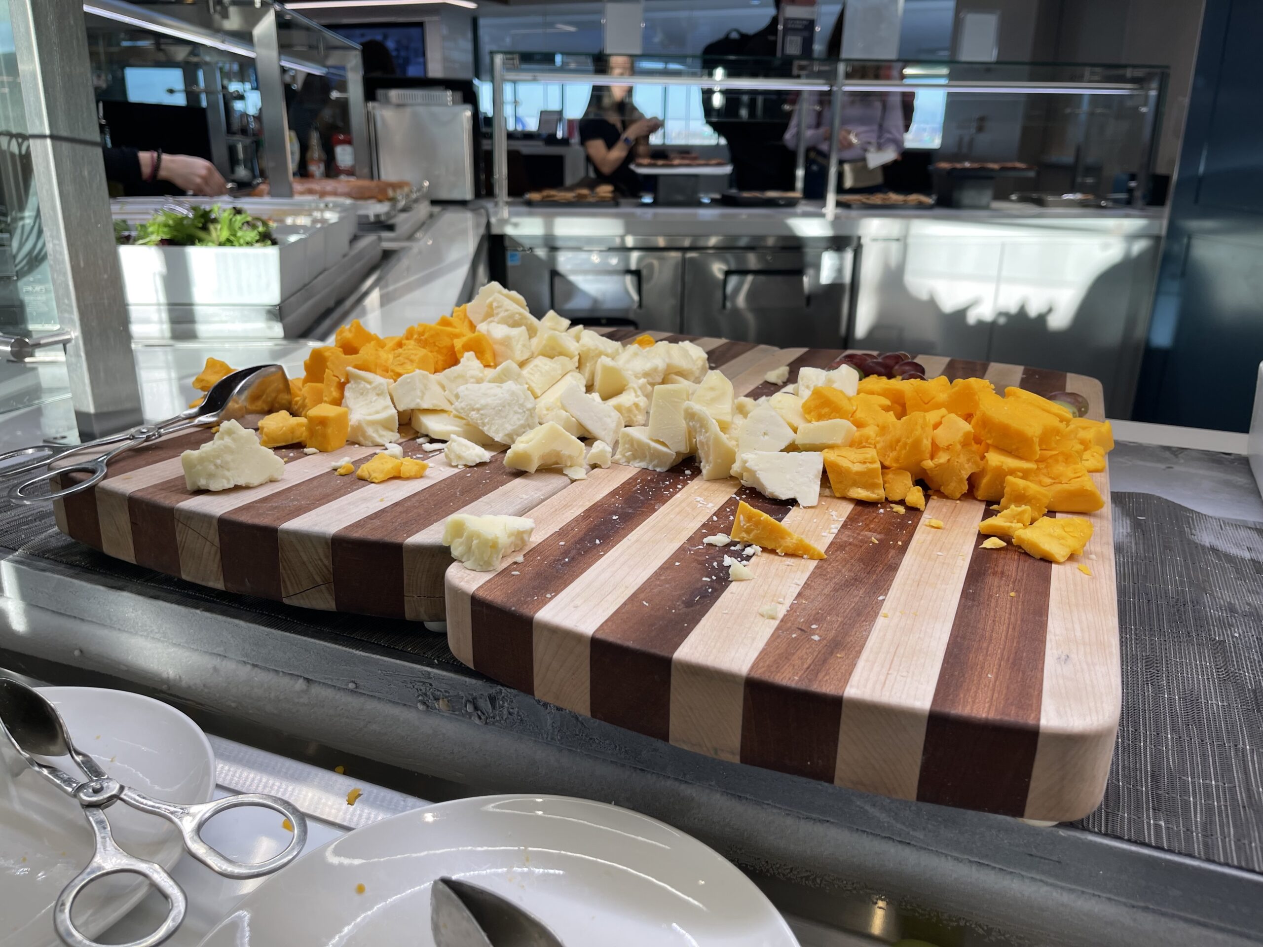 a cutting board with cheese on it