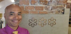 a man smiling at the camera