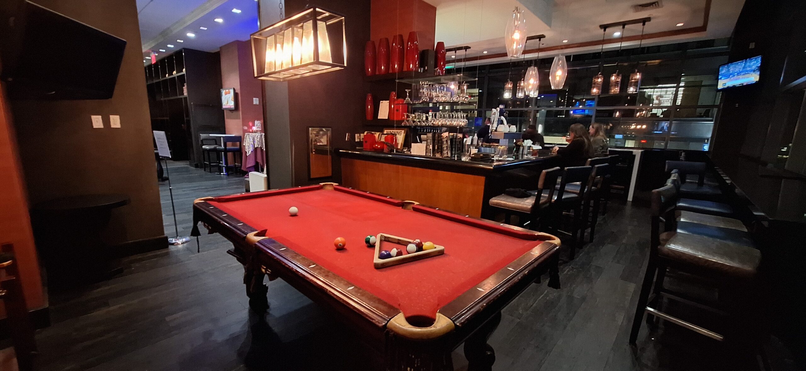 a pool table in a bar
