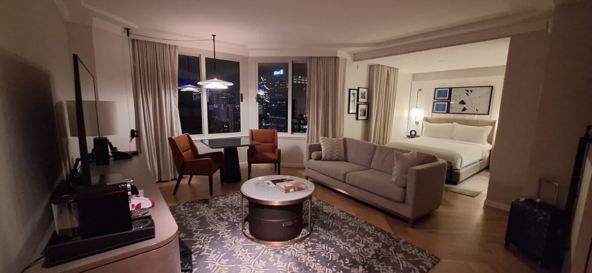 a living room with a couch and a table