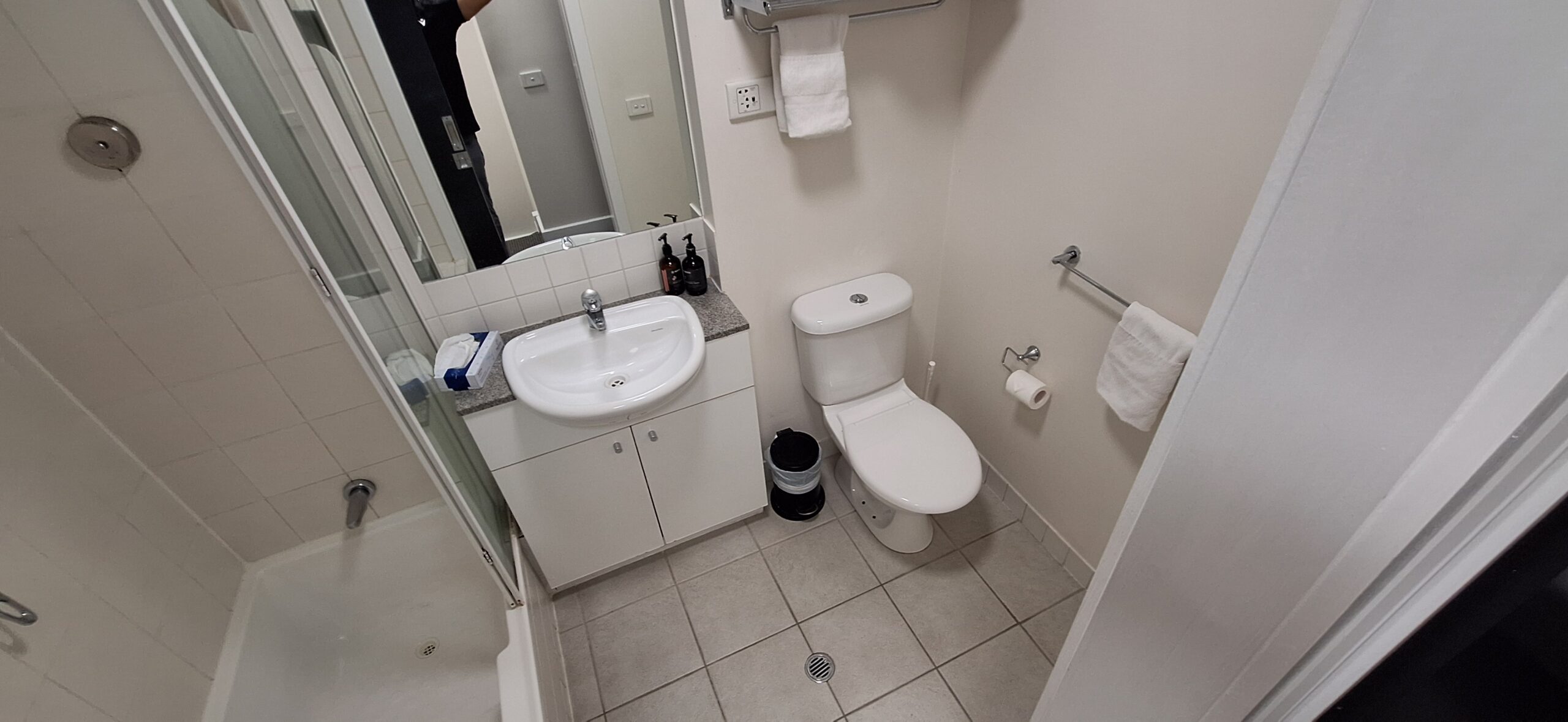 a bathroom with a sink and toilet