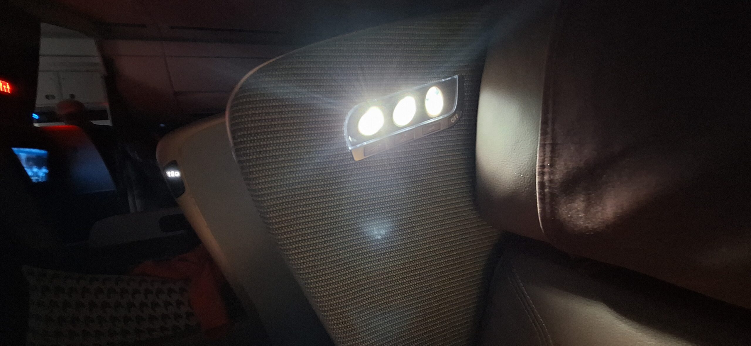 a light on the back of a seat