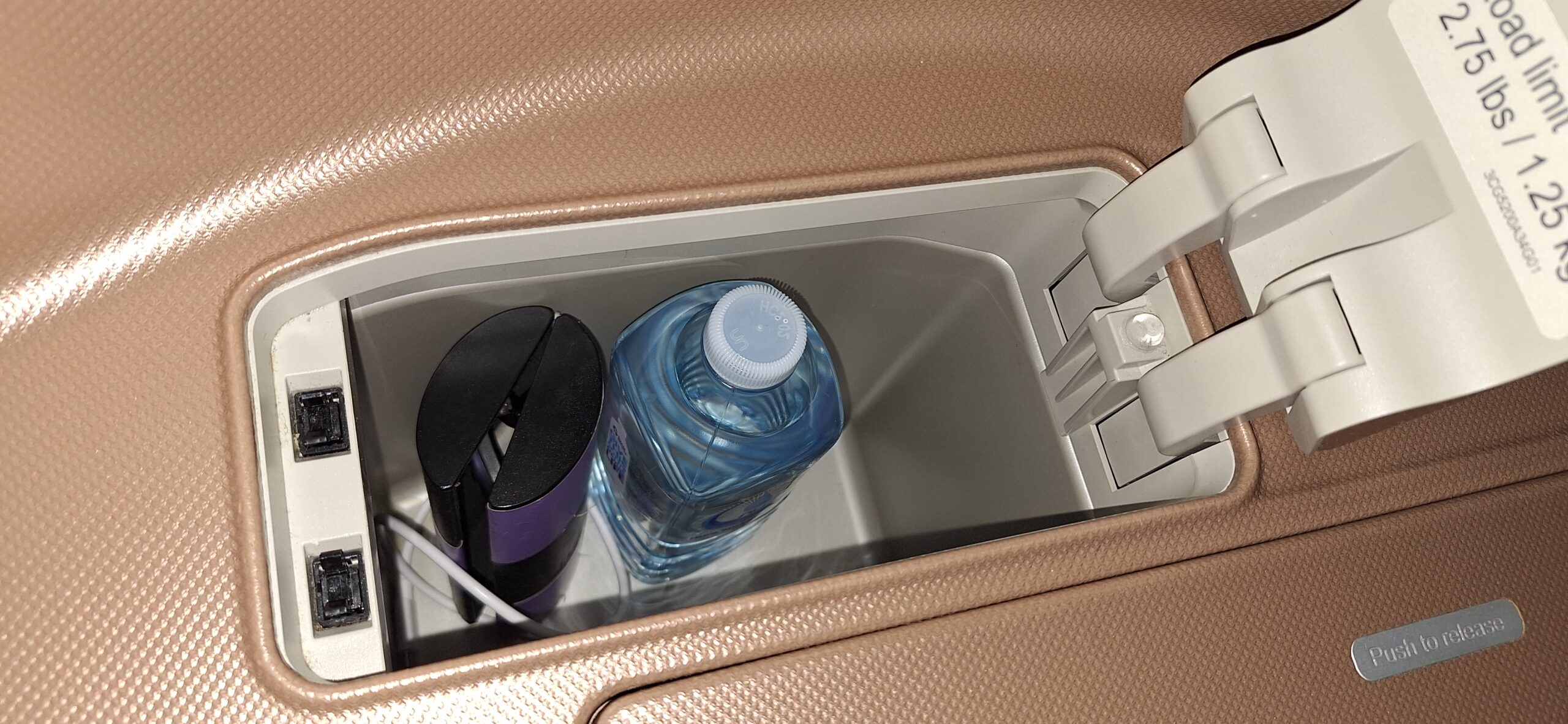 a bottle of water in a cup holder