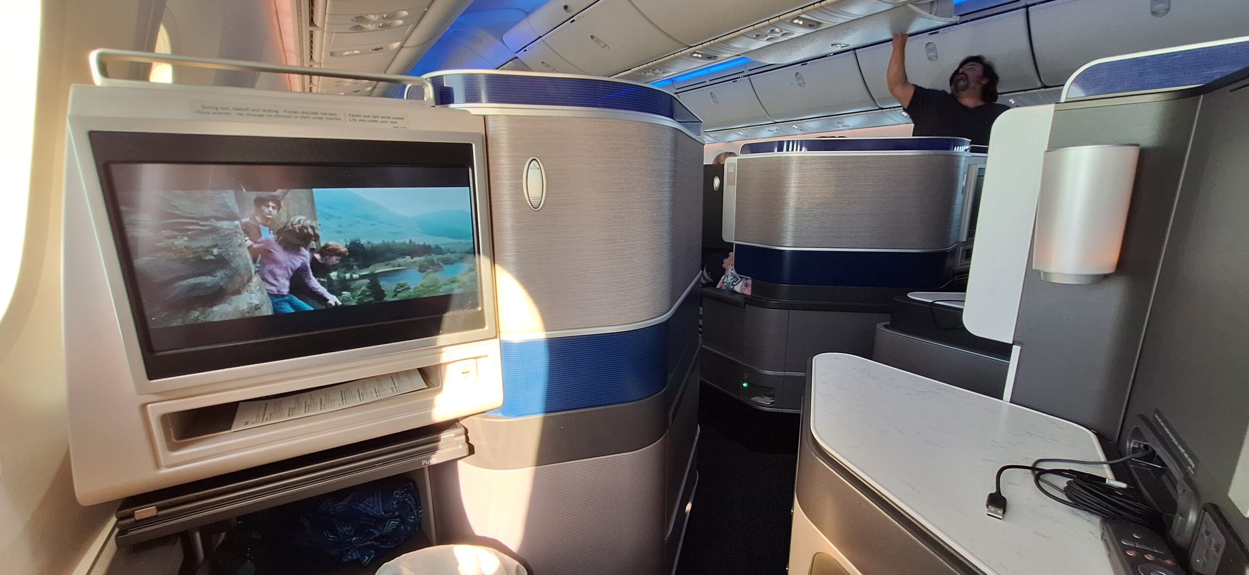 a tv and monitors in an airplane