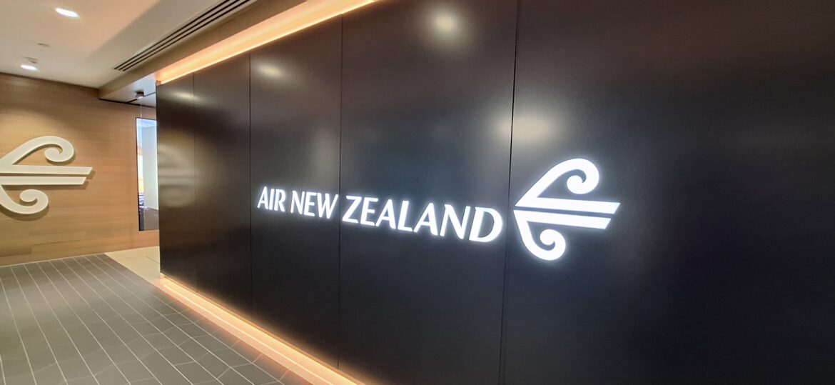 Air New Zealand Lounge in MEL – entrance a black wall with white text