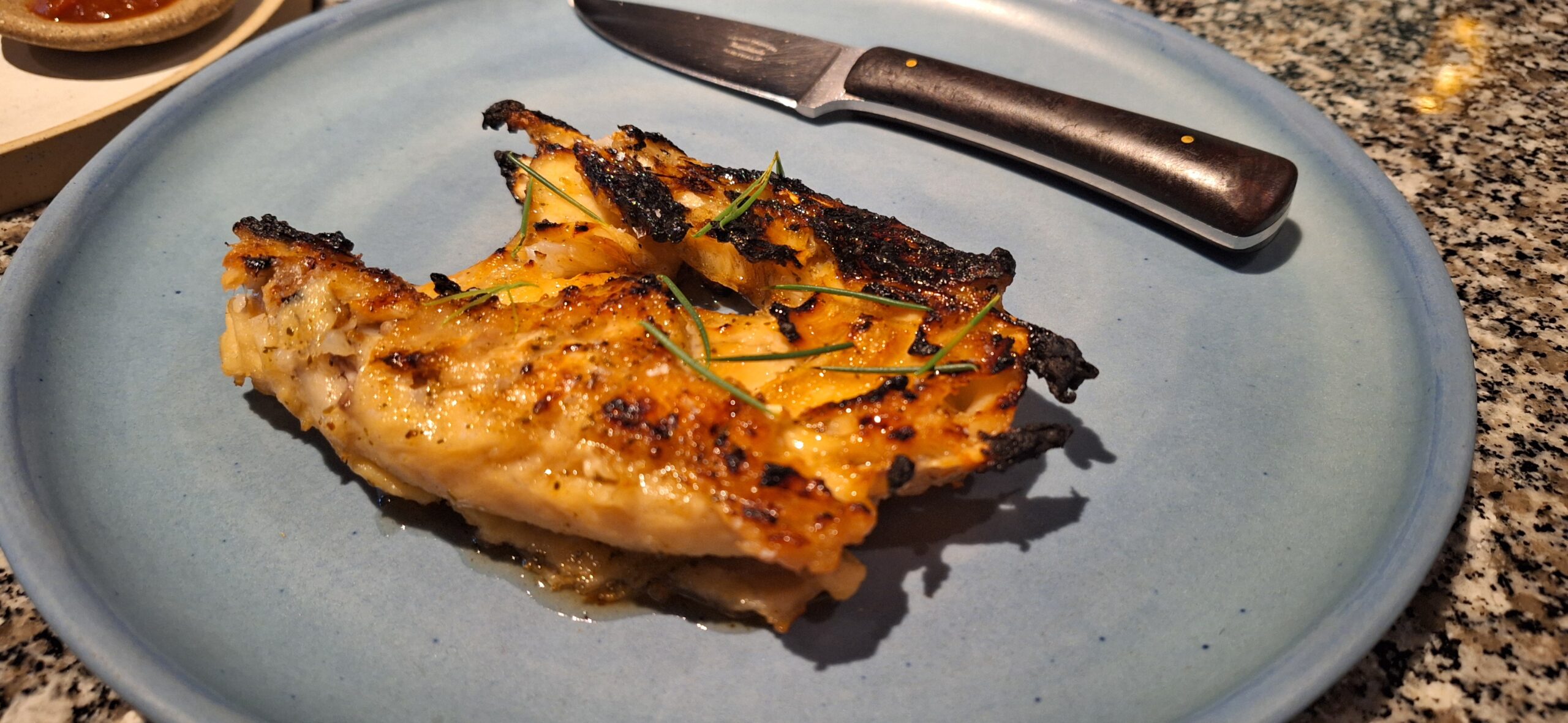 a plate of food with a knife