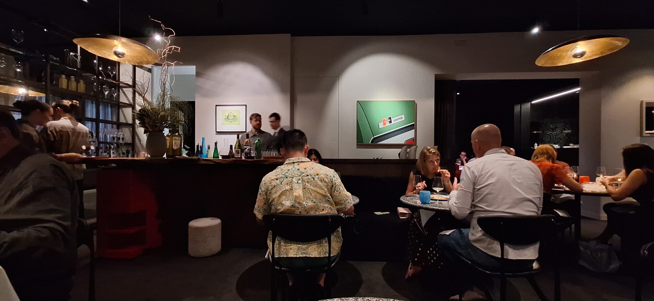 a group of people sitting at a table