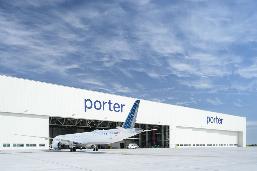 a plane parked in a hangar