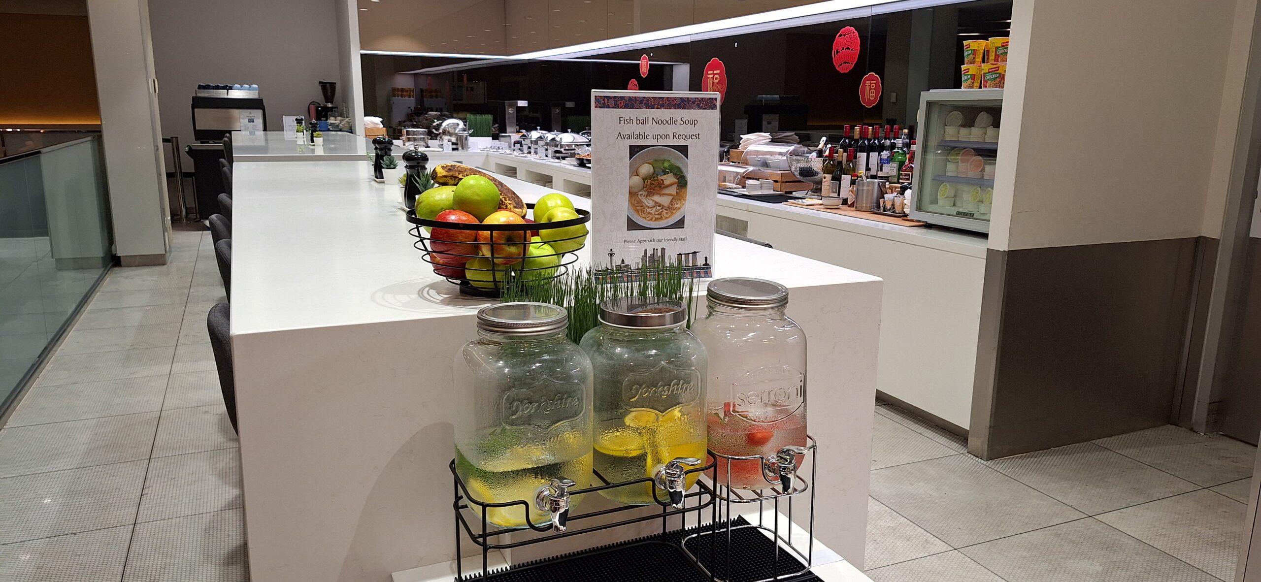 a group of glass jars with liquid in it