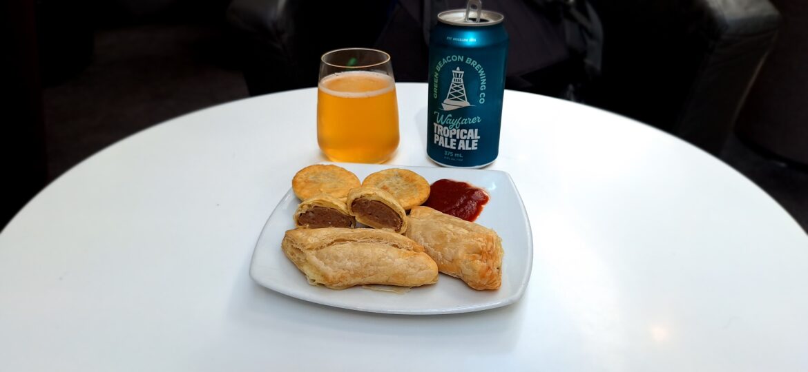 Virgin Australia Brisbane Lounge – Lunch buffet options (1) a plate of pastries and a drink on a table