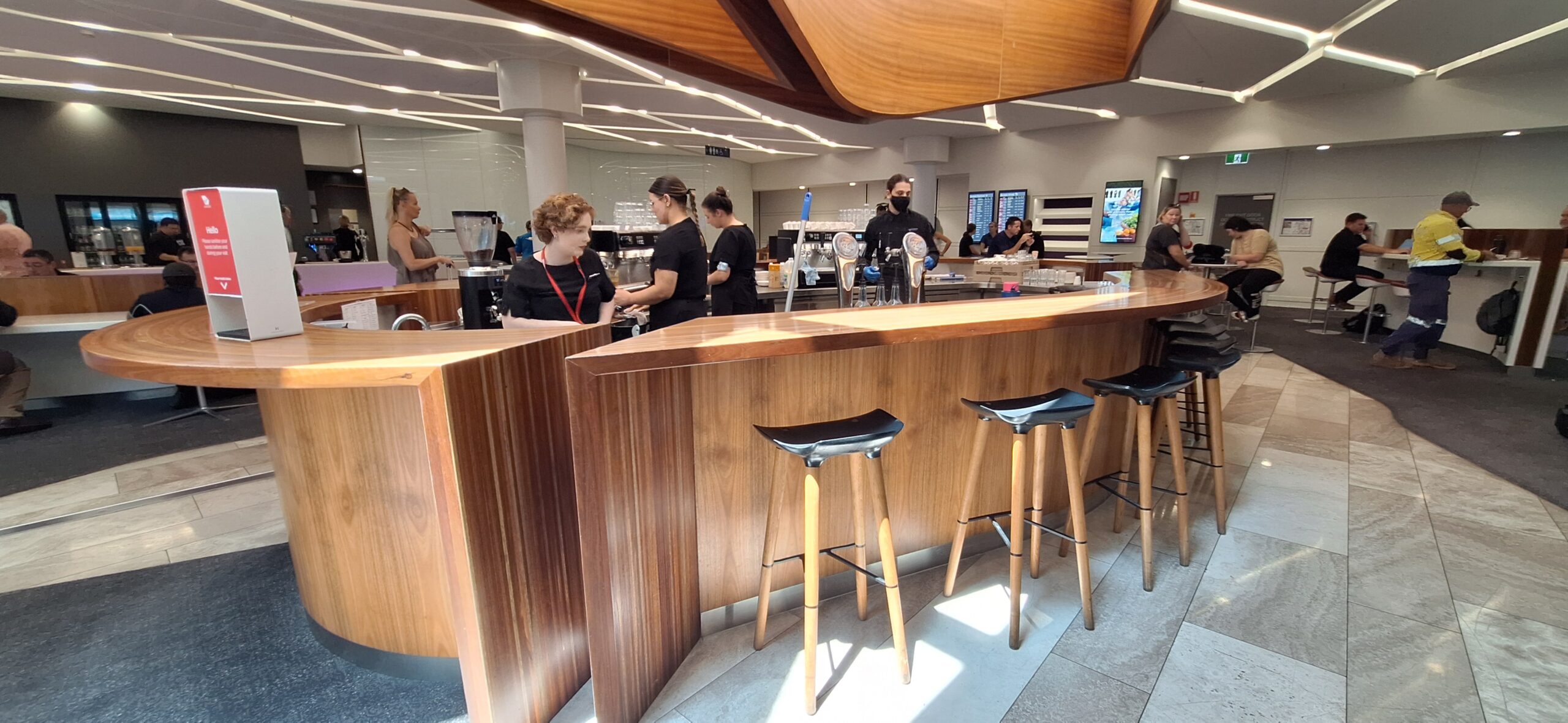 people standing behind a counter