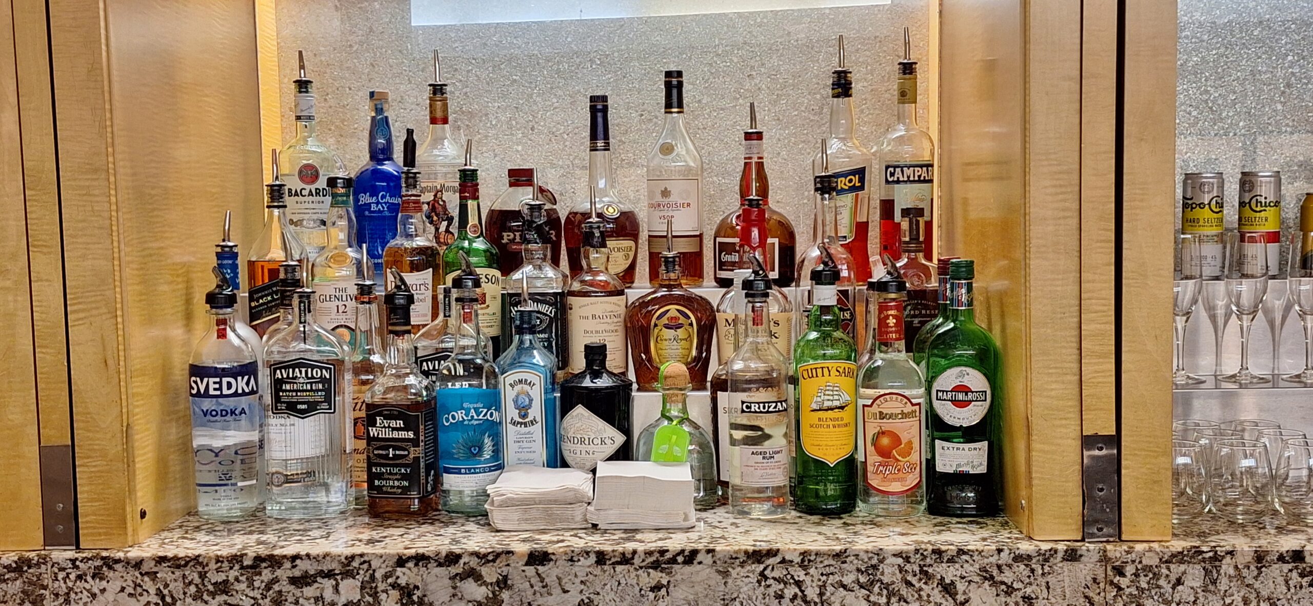 a group of bottles of alcohol on a counter