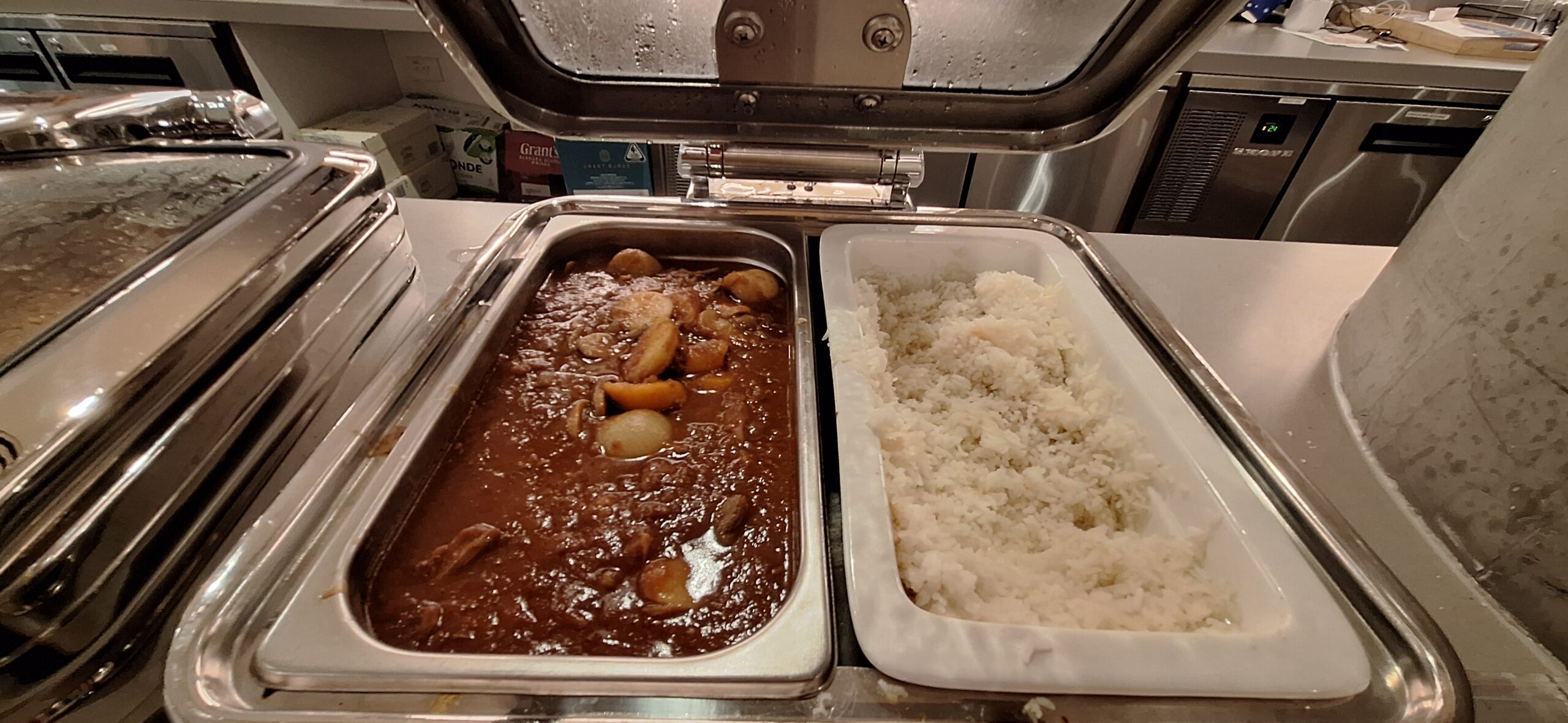 a trays of food in a container