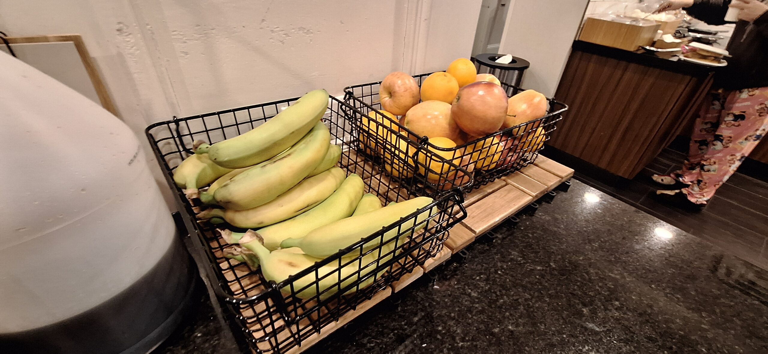 a group of fruit in baskets