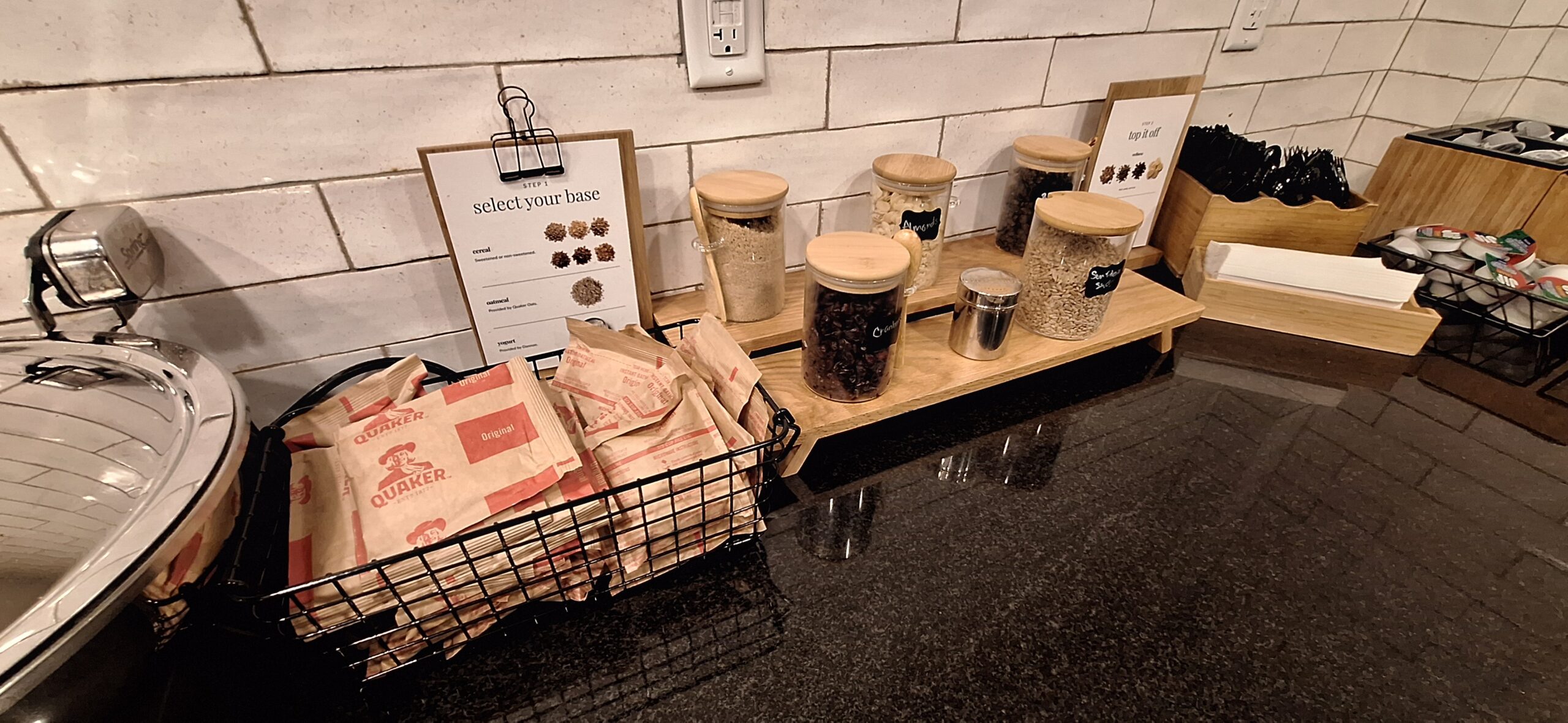 a shelf with different types of spices and a basket of paper