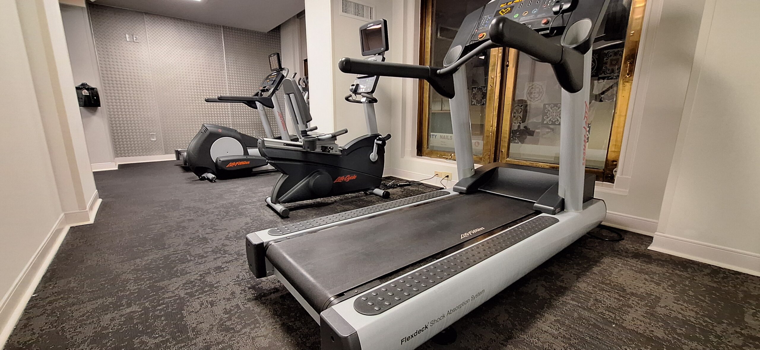 a group of treadmills in a room